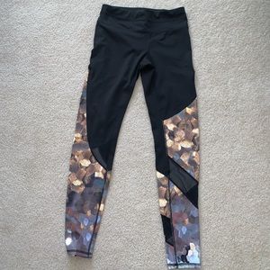 Unique black and gold athlete leggings